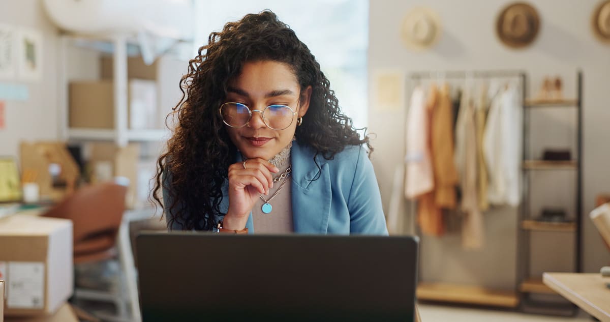Founder reviewing funding strategy notes at a desk